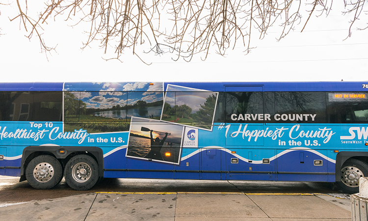 Photo of a bus branded with Carver County logo and images