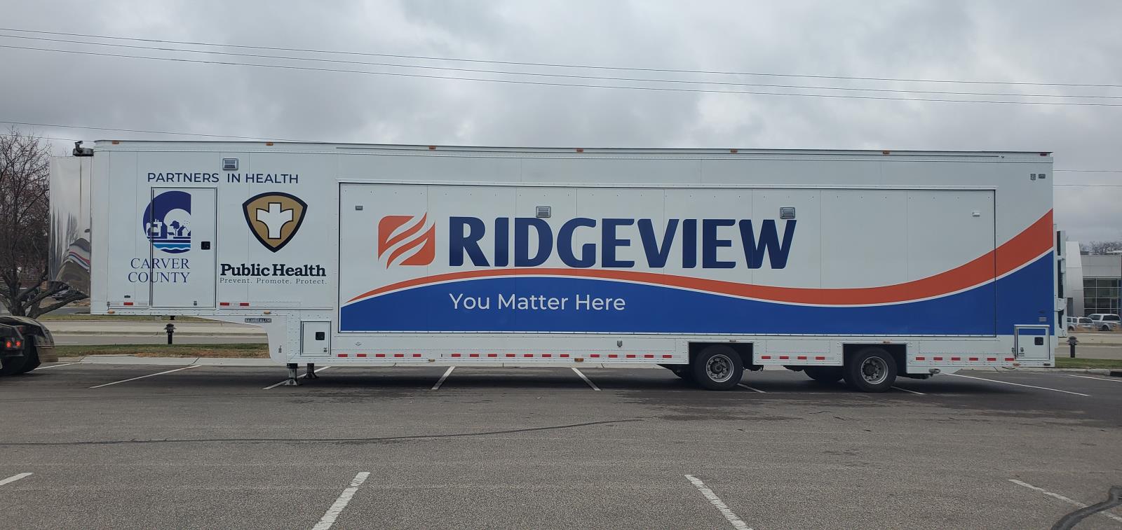 Photo of County and Ridgeview mobile clinic semi-trailer