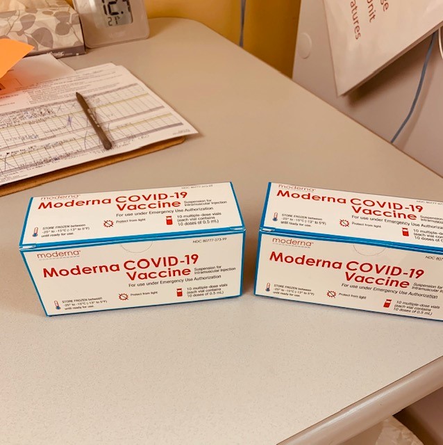 Photo of box containing Moderna COVID-19 vaccine